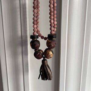 Leather, beads and suede necklace.